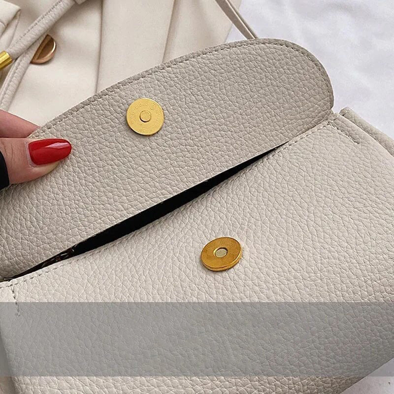 Lacey - Stilfuld crossbody-taske med elefantvedhæng