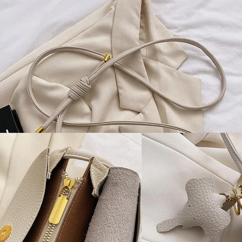 Lacey - Stilfuld crossbody-taske med elefantvedhæng