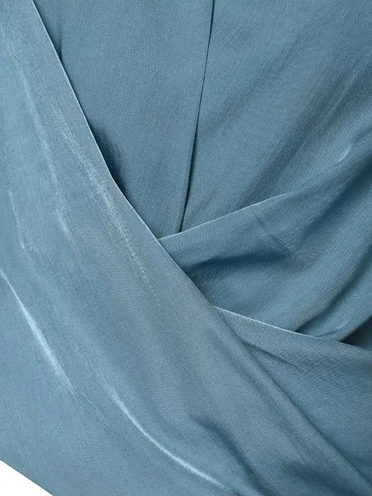 Julie - Elegant lange pufærmer med V-hals top