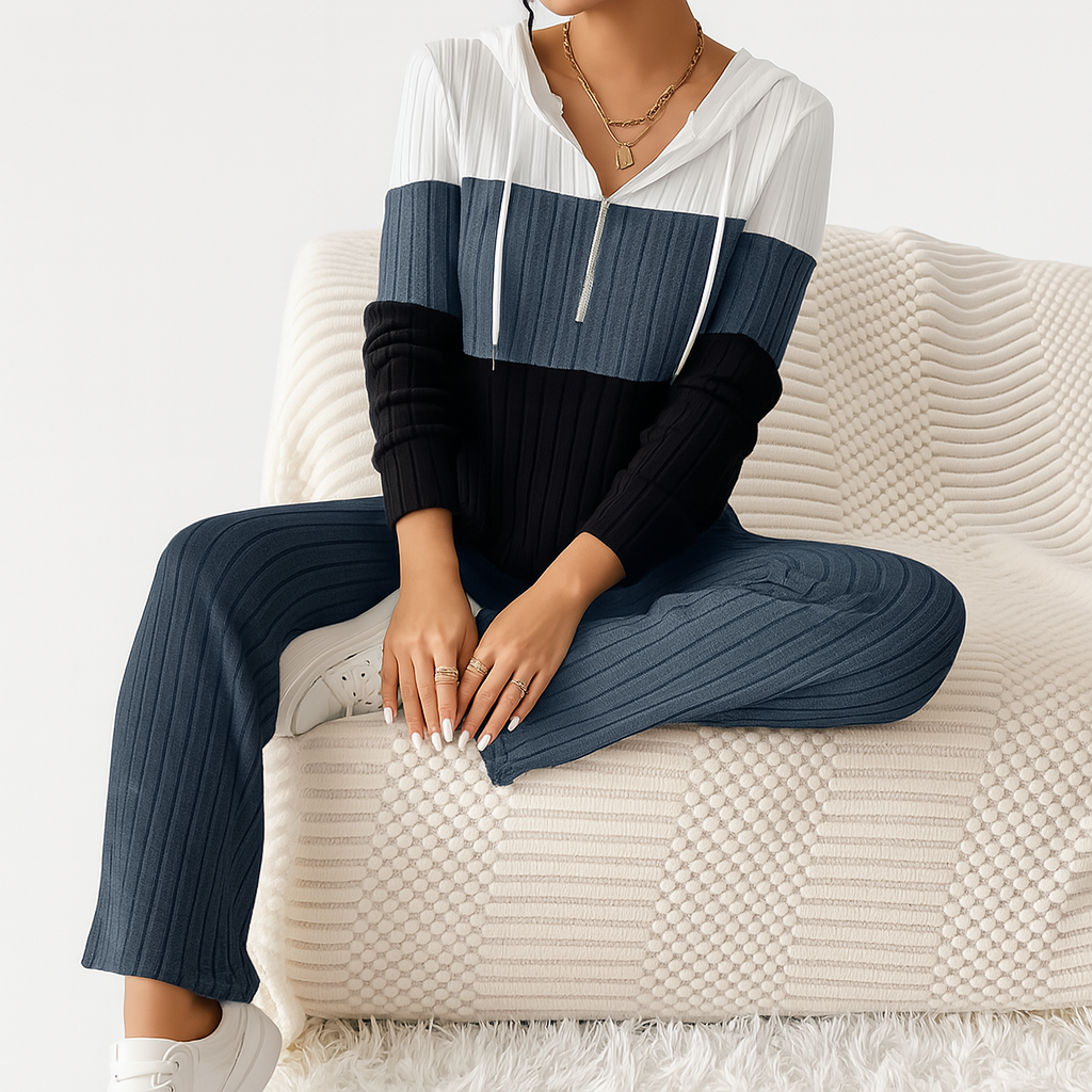 Damesæt med lynlås i to dele – stribet top og højtaljede bukser med vide ben