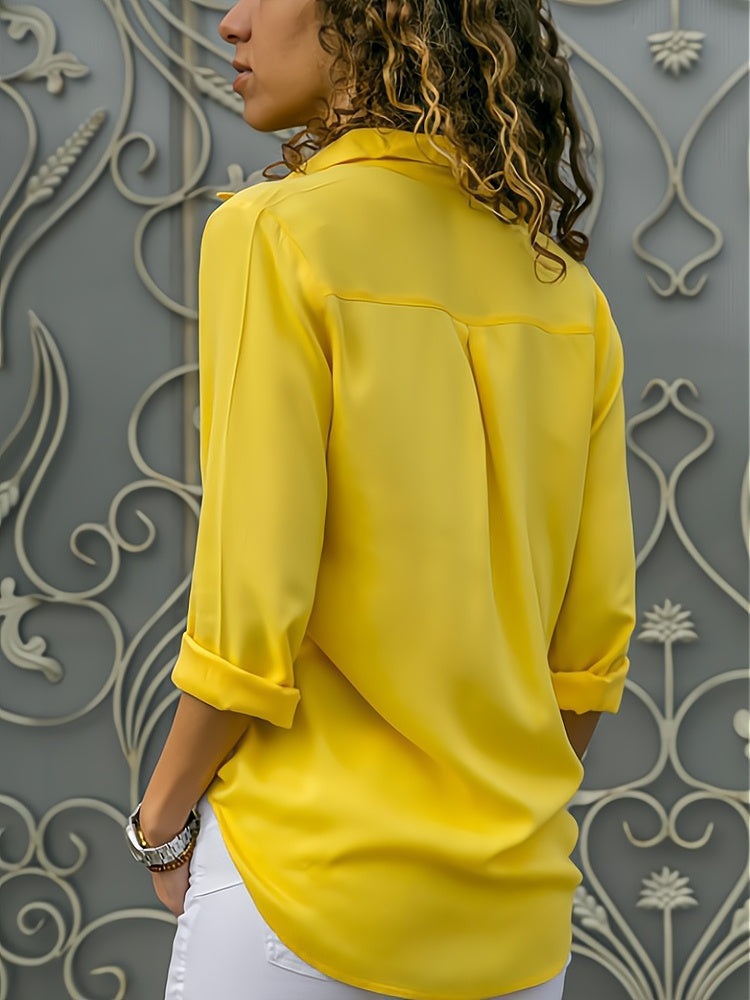 Lara - Elegant langærmet top med knapper