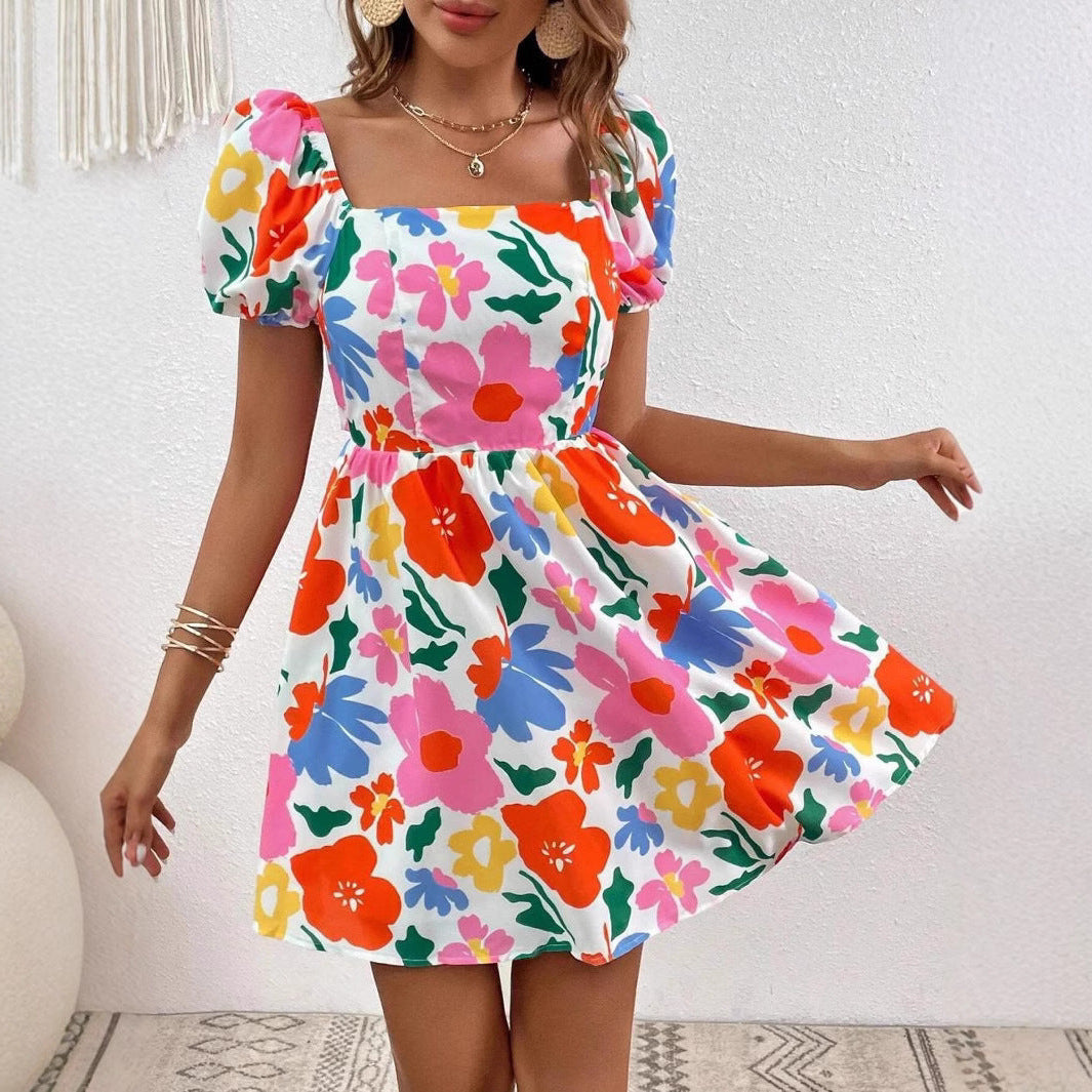 Dianna - printet strandkjole med lanterneærmer