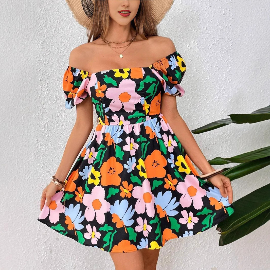 Dianna - printet strandkjole med lanterneærmer