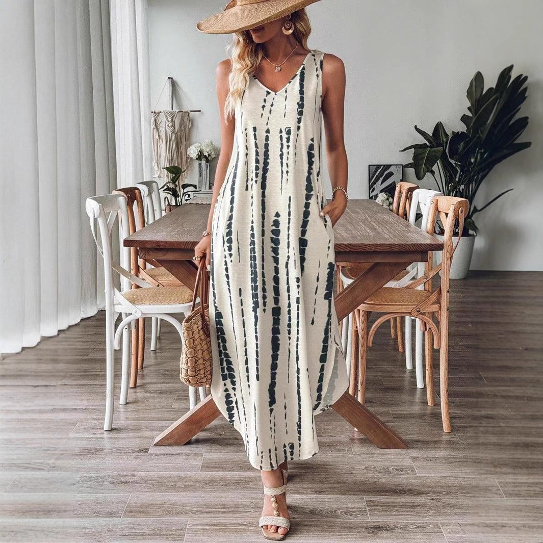 Sara - ærmeløs kjole med V-udskæring med slids