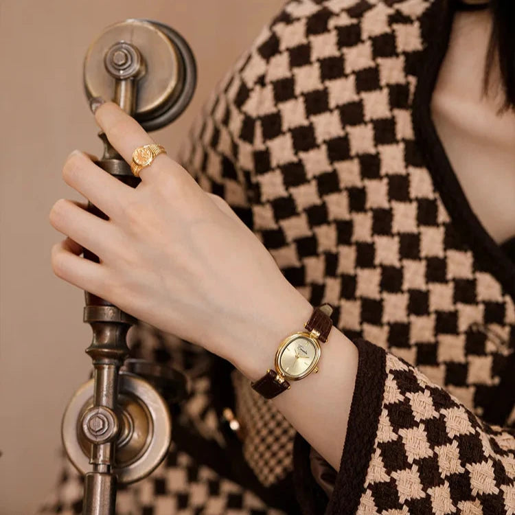 Svana - Elegant guldskive quartz ur