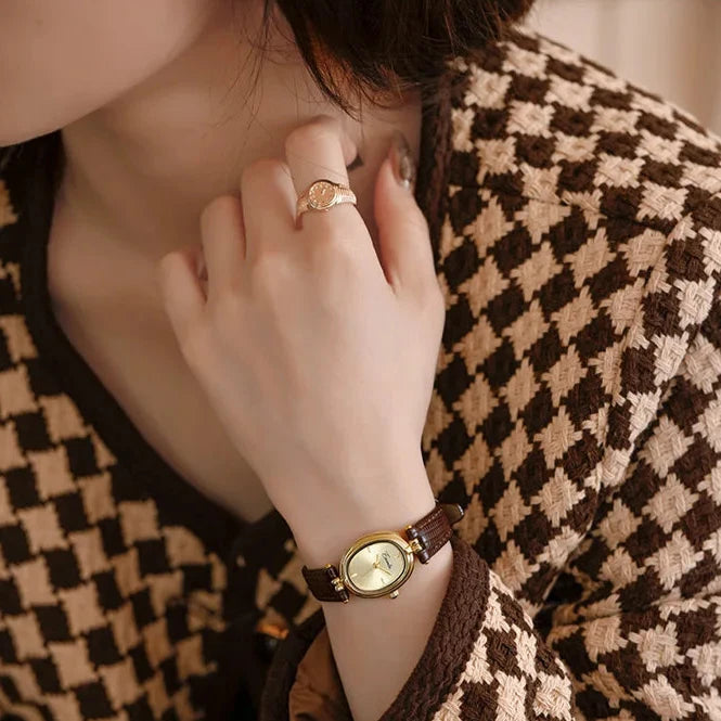 Svana - Elegant guldskive quartz ur