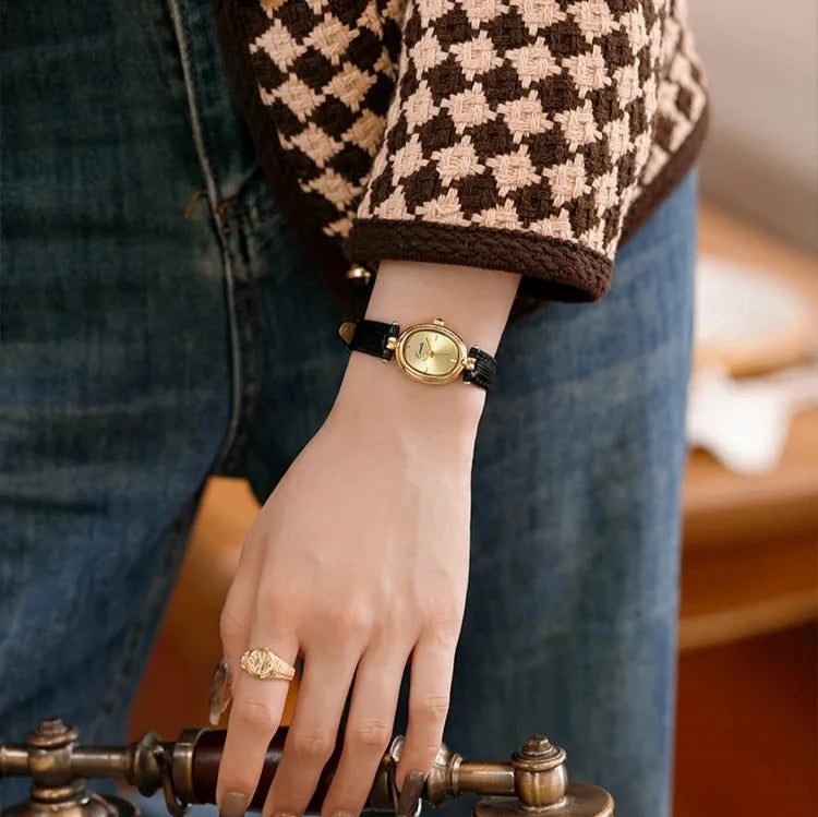 Svana - Elegant guldskive quartz ur