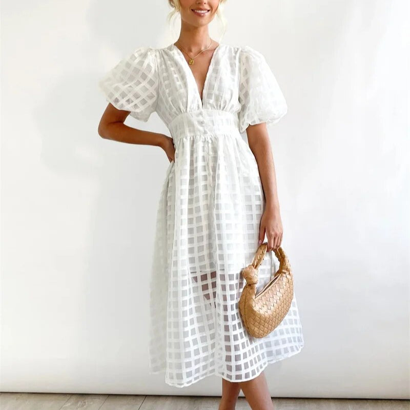 Solvej - Vintage midikjole med pufærmer