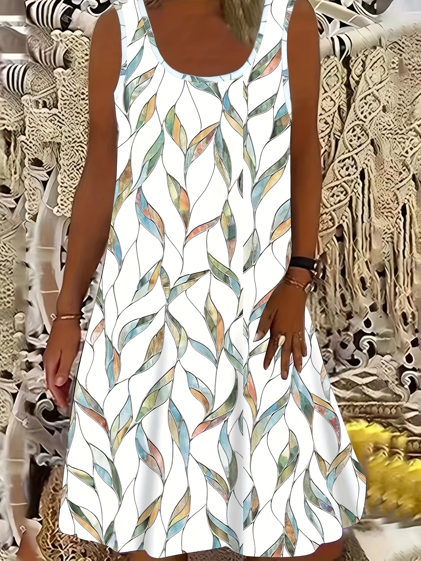Clara - Moderne Ærmeløs Kjole med Bladmønster