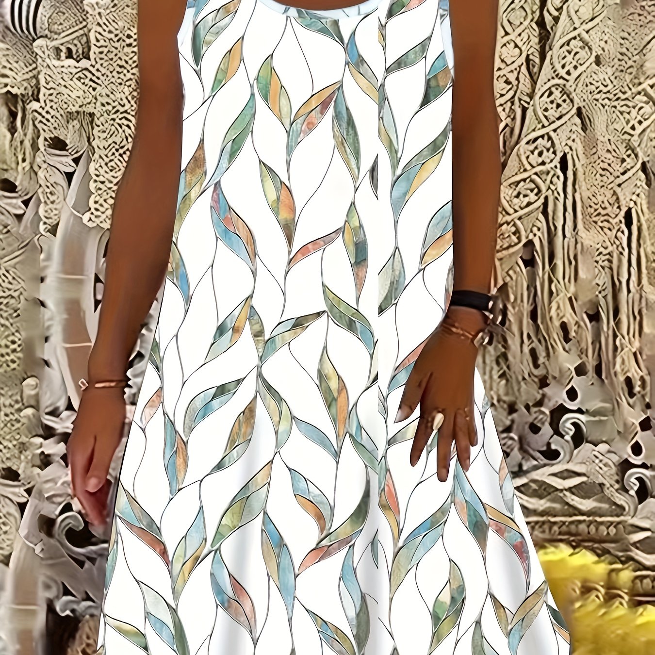 Clara - Moderne Ærmeløs Kjole med Bladmønster