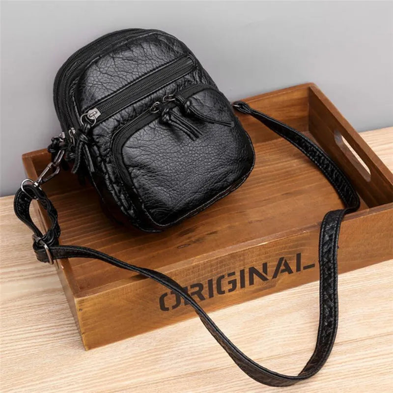 Izzy - Stilfuld skuldertaske med justerbar rem