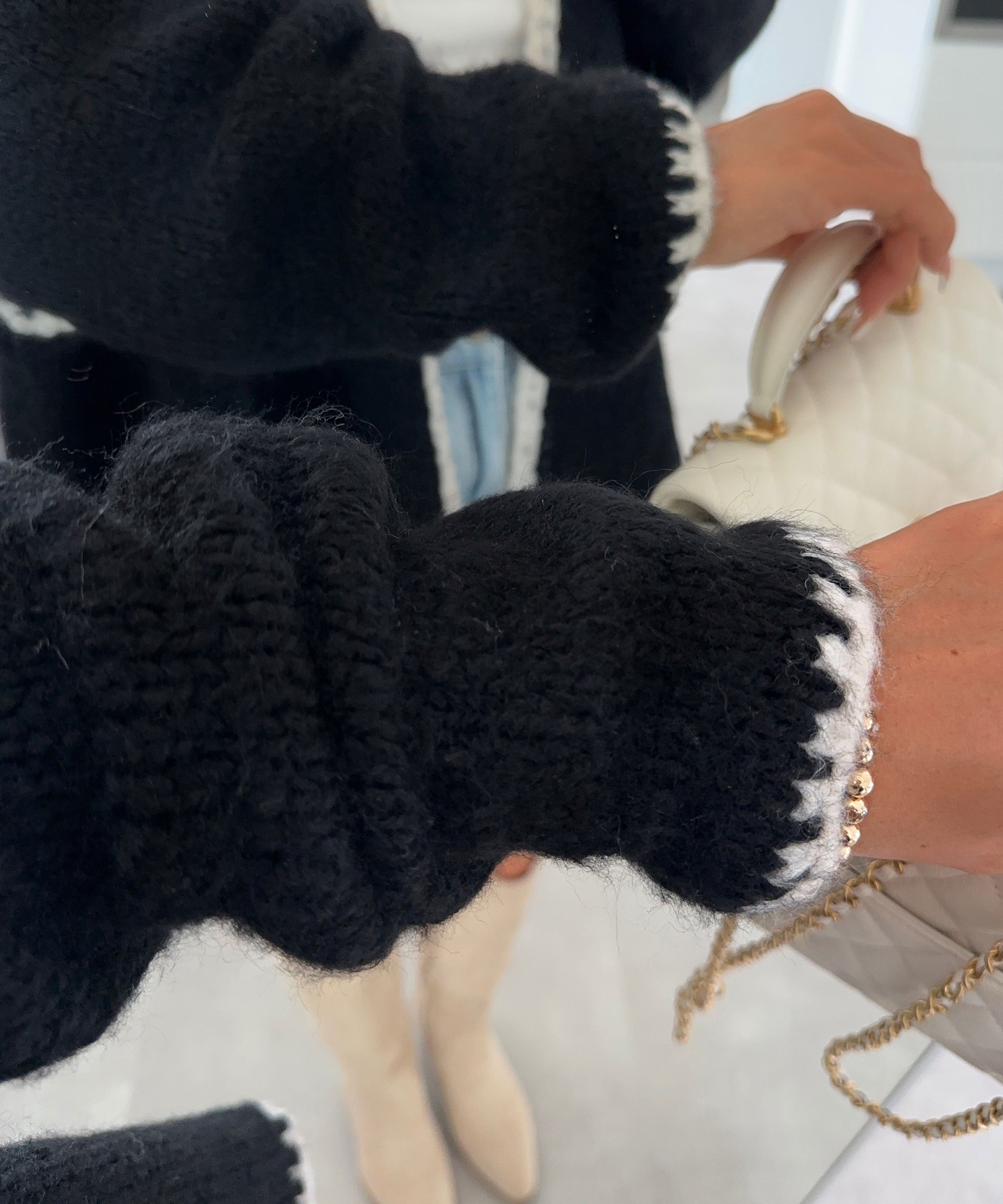 Veste i sort strik Hera - afslappet stil og hyggelig sofistikering