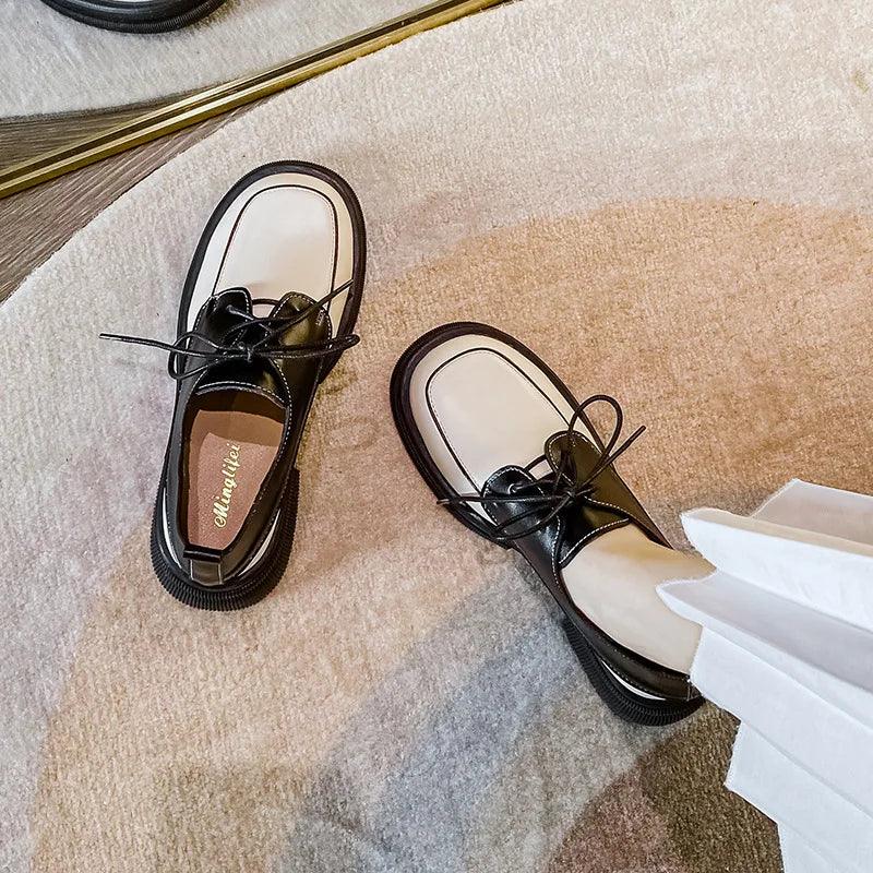 Stella - Tofarvede loafers med snørebånd med rund tå