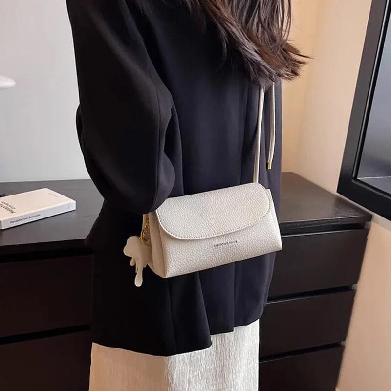 Lacey - Stilfuld crossbody-taske med elefantvedhæng