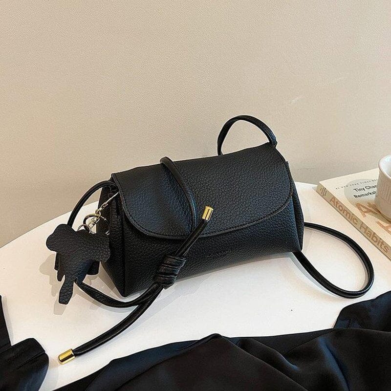 Lacey - Stilfuld crossbody-taske med elefantvedhæng