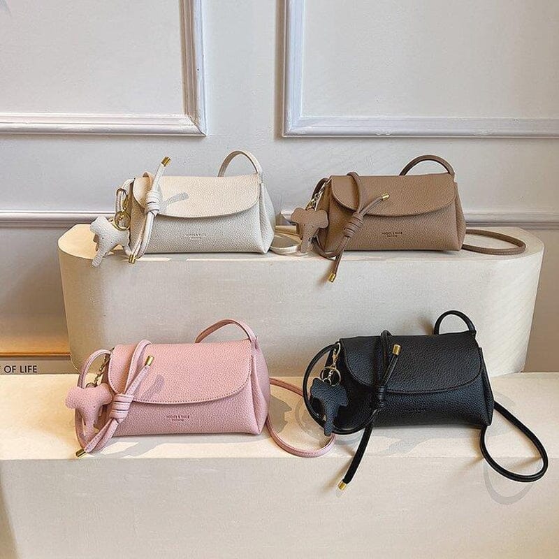 Lacey - Stilfuld crossbody-taske med elefantvedhæng