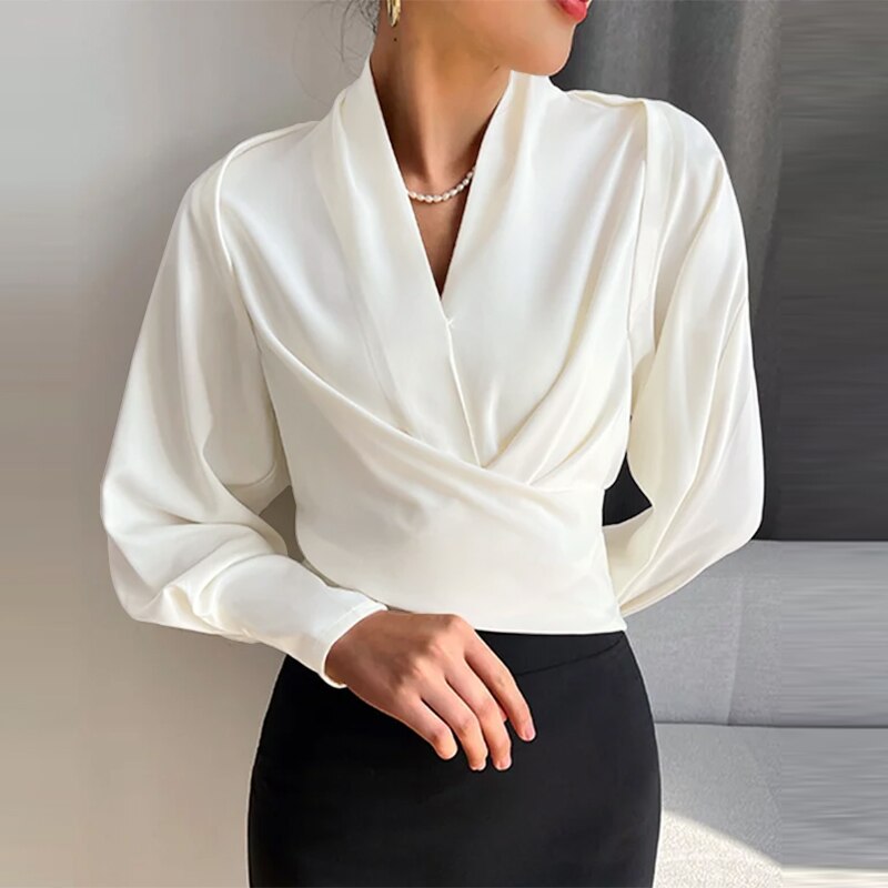 Julie - Elegant lange pufærmer med V-hals top